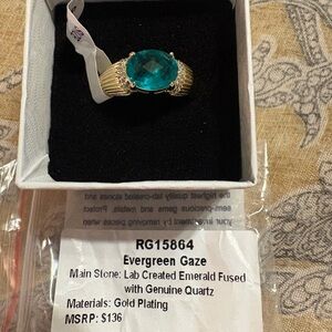 Gold and Green Solitaire Ring with Emerald Stone